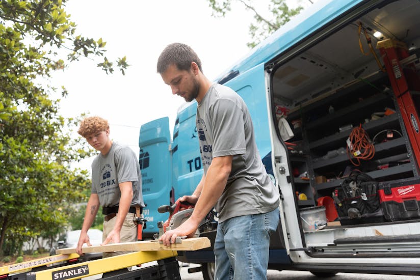 YTT guys with sawhorses
